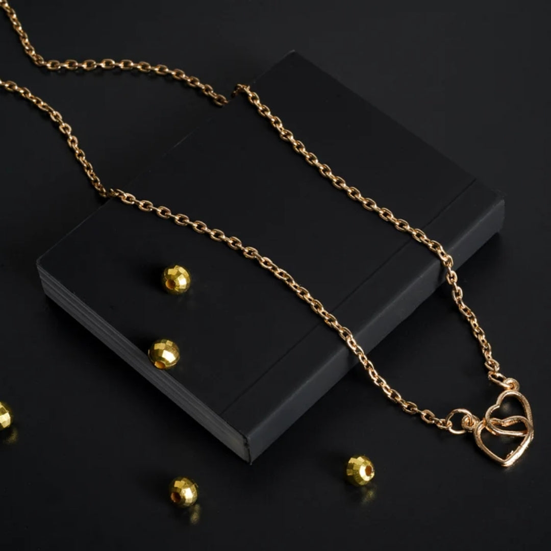 Double Golden Heart Pendant - A Symbol of Love and Unity