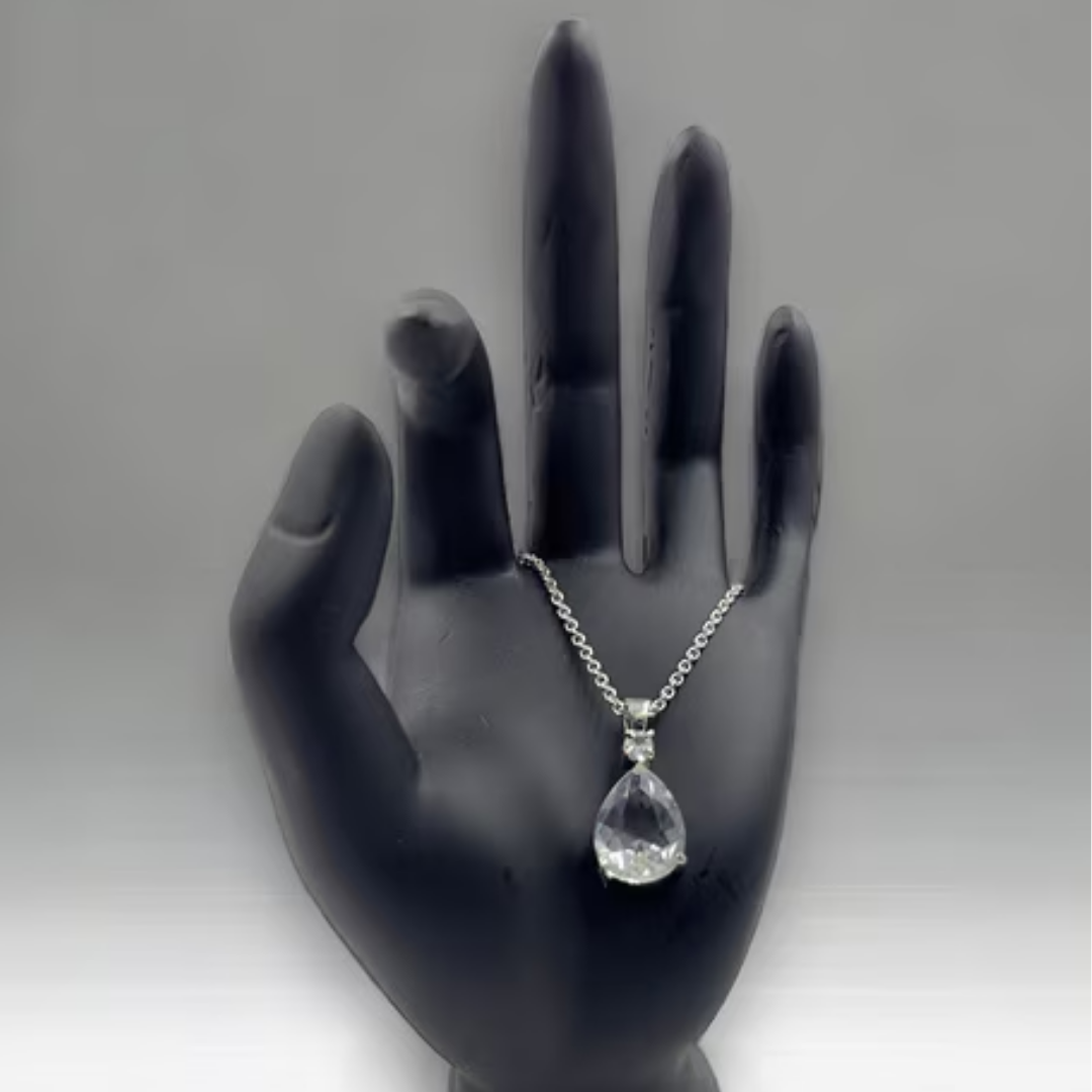 White Oval Artificial Diamond Pendant with Square-Shaped Red Stone: A Timeless Blend of Elegance and Boldness