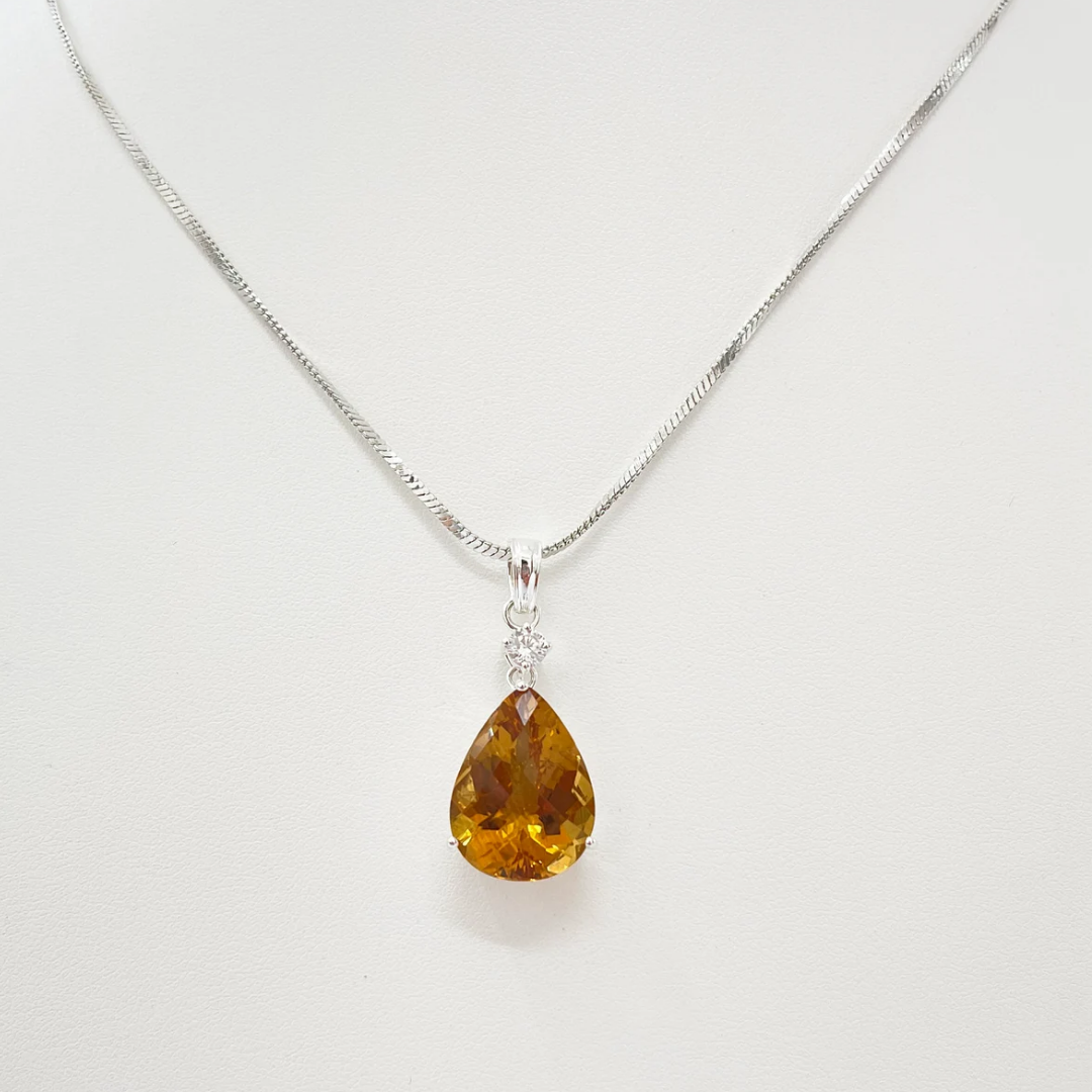 Yellow Oval Artificial Diamond Pendant with Square-Shaped Red Stone: A Bold, Elegant Fusion of Color and Style