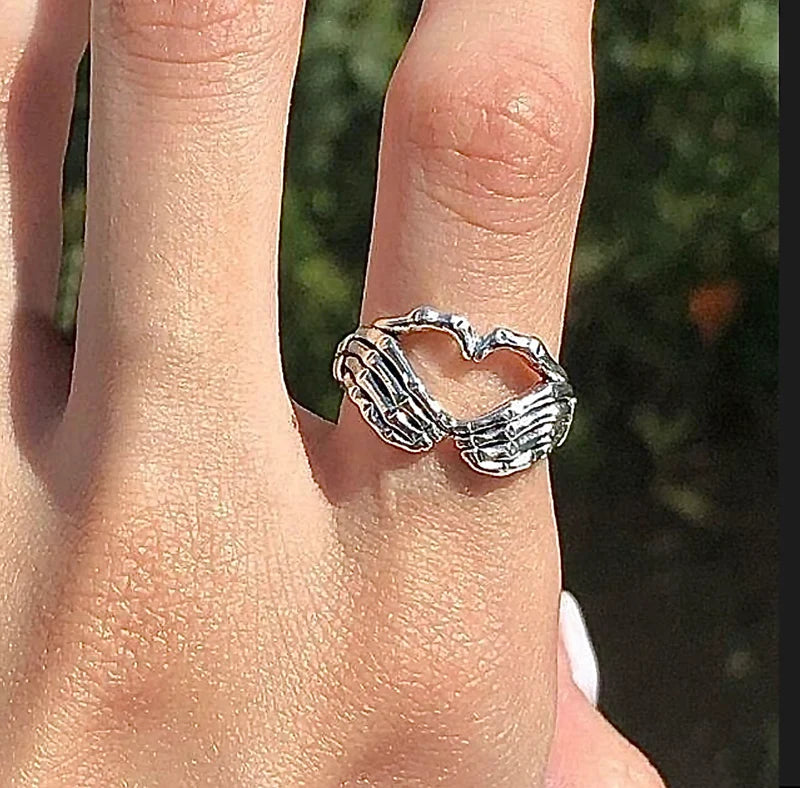 SKELETON HAND HEART RING